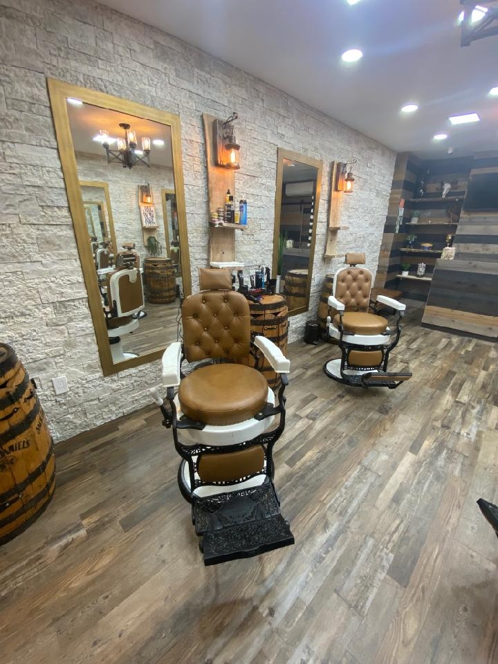 Are classic barber shops known for providing a specific atmosphere or experience?